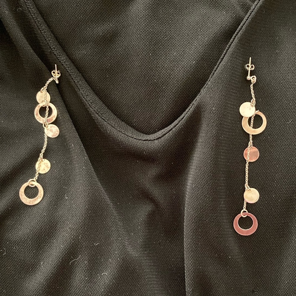 Sterling silver pierced modern circular long duster earrings. Pretty. Unworn.